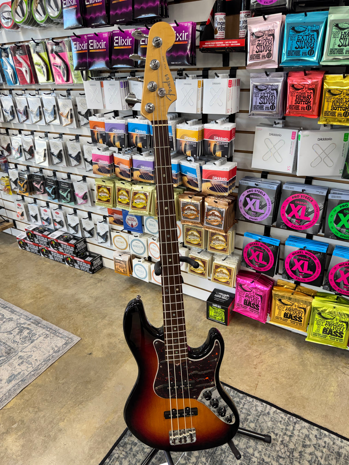 Used 2003 Fender American Deluxe Jazz Bass, 3-Color Sunburst - full front view - Pop's Music, Jackson TN