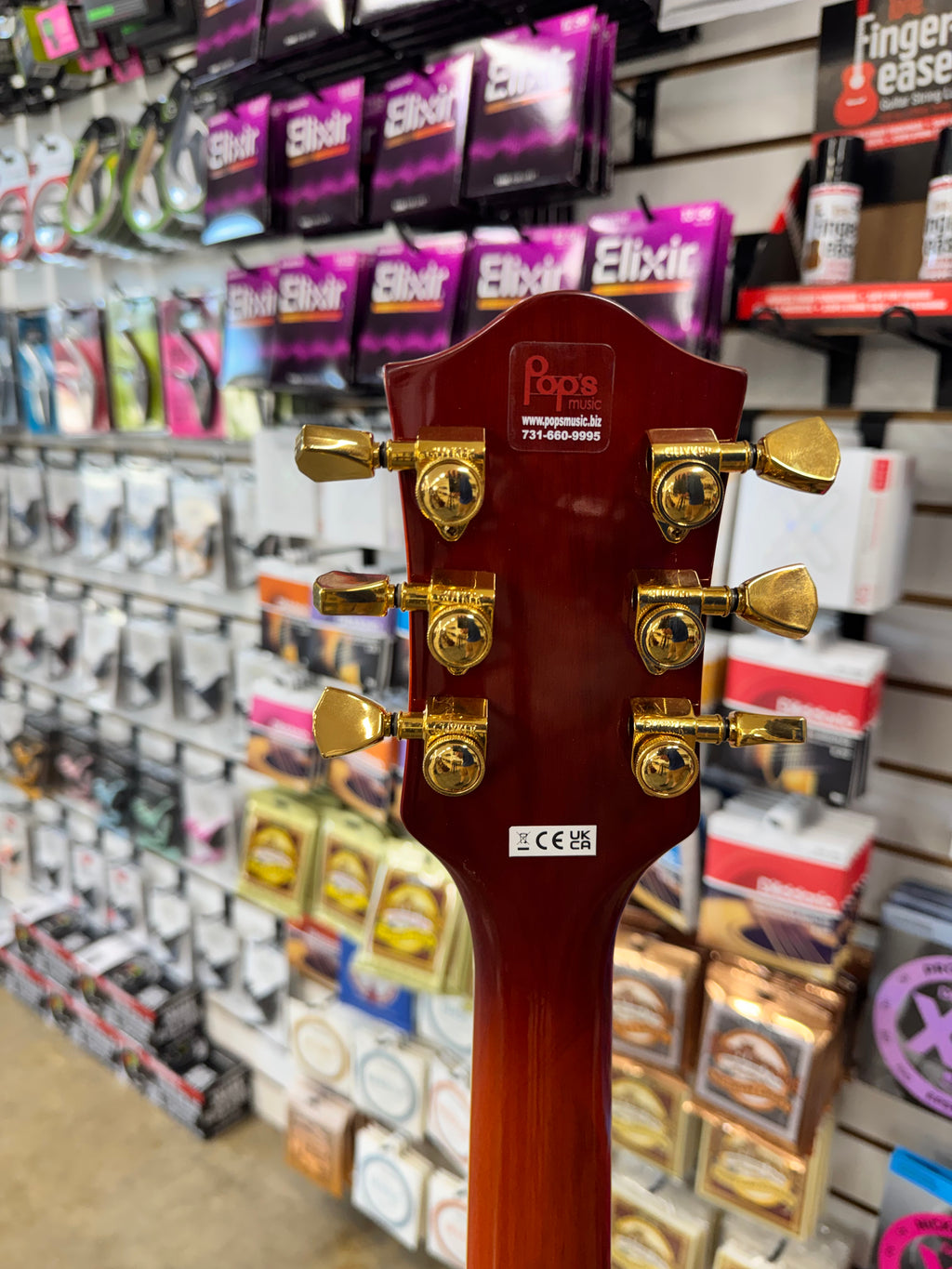 Used Gretsch Streamliner Center Block Cat-Eye, Abbey Ale - back of headstock with gold tuners