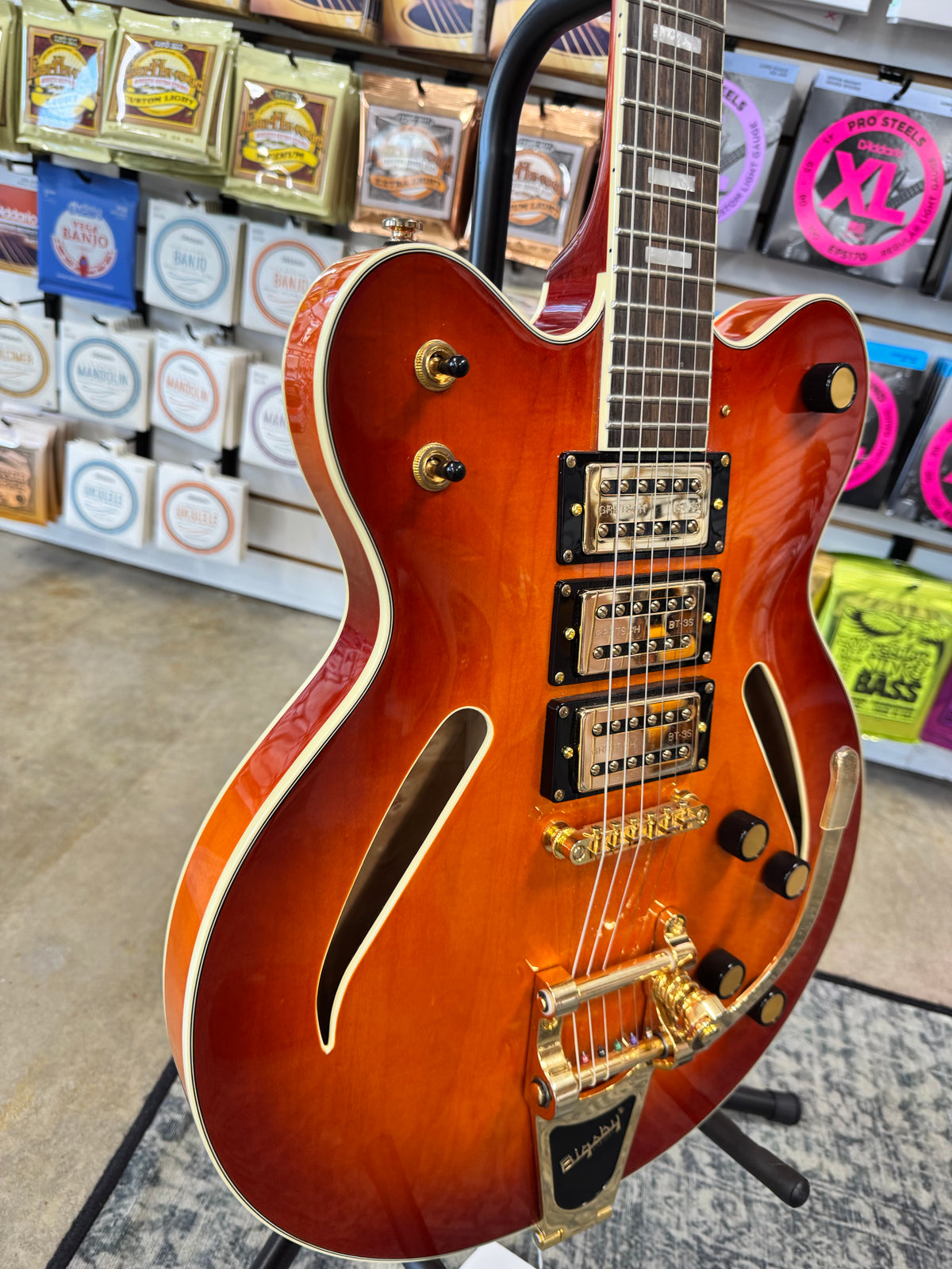 Used Gretsch Streamliner Center Block Cat-Eye, Abbey Ale - angled body view showing cat-eye sound holes