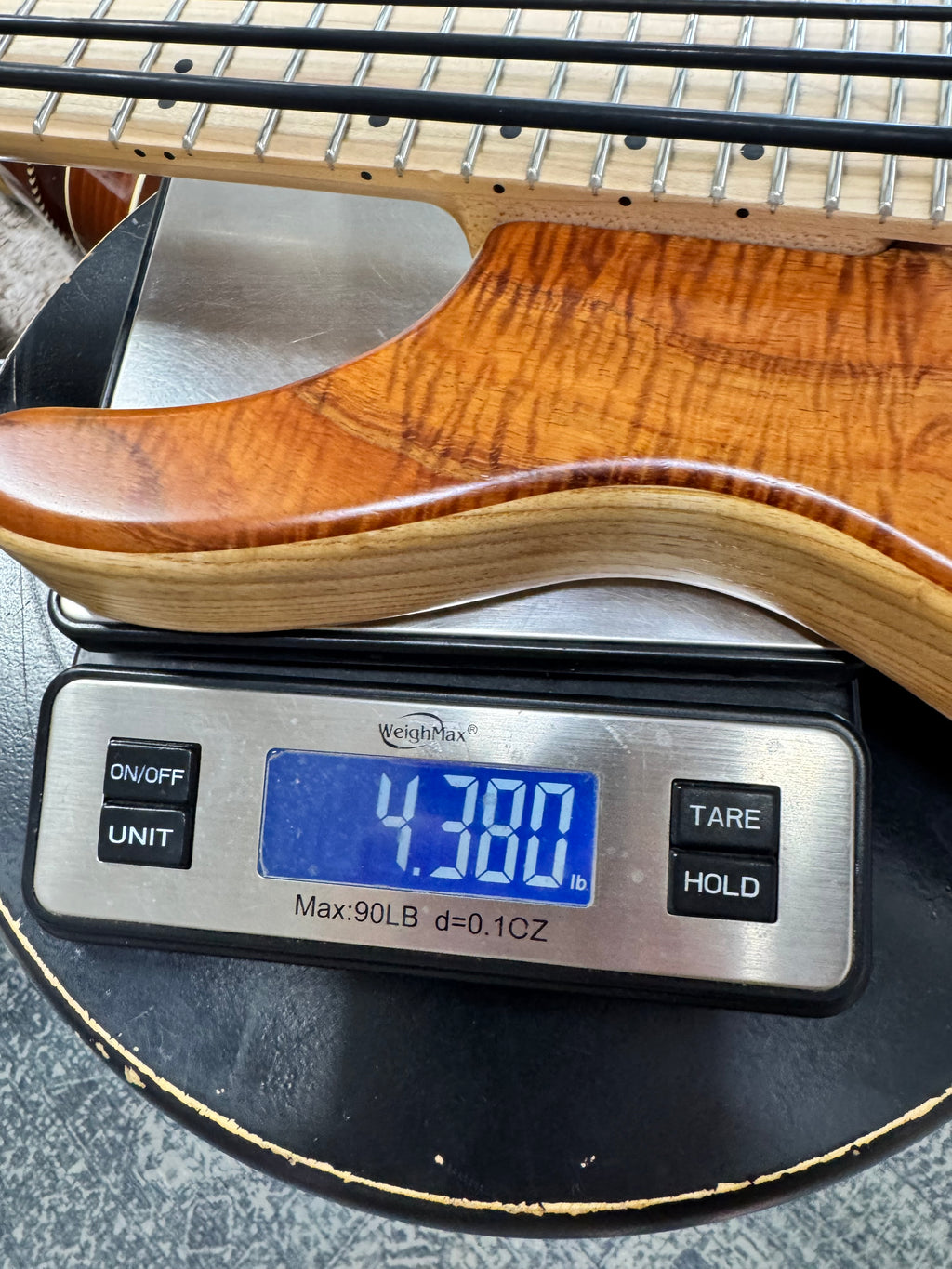 Used Kala Hawaiian Koa California U-Bass, Natural - weighs about 4.4 lb on our store scale