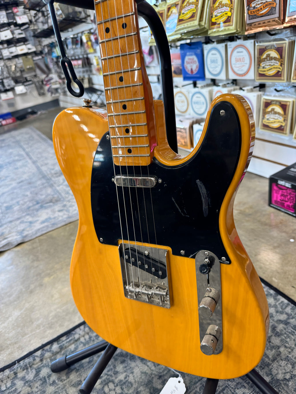 Used Squier Classic Vibe '50s Telecaster, Butterscotch Blonde - angled view of pickups and controls