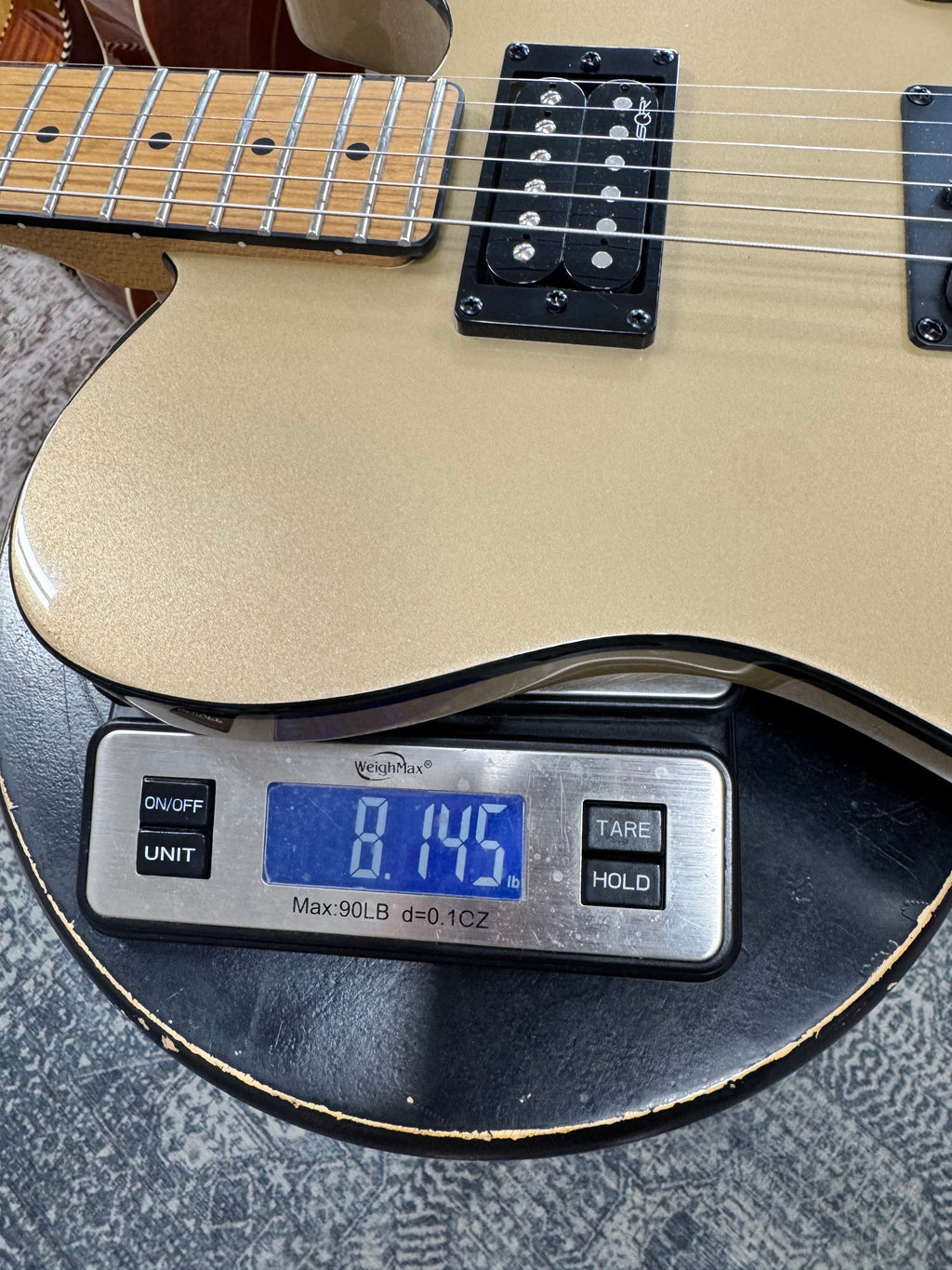 Used Squier Contemporary Telecaster RH, Shoreline Gold - weighs about 8.1 lb on our store scale