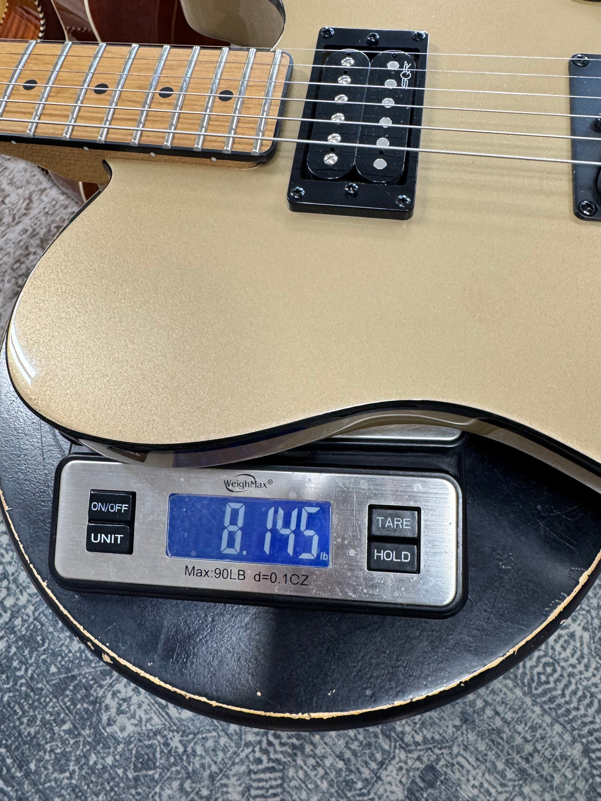 Used Squier Contemporary Telecaster RH, Shoreline Gold - weighs about 8.1 lb on our store scale