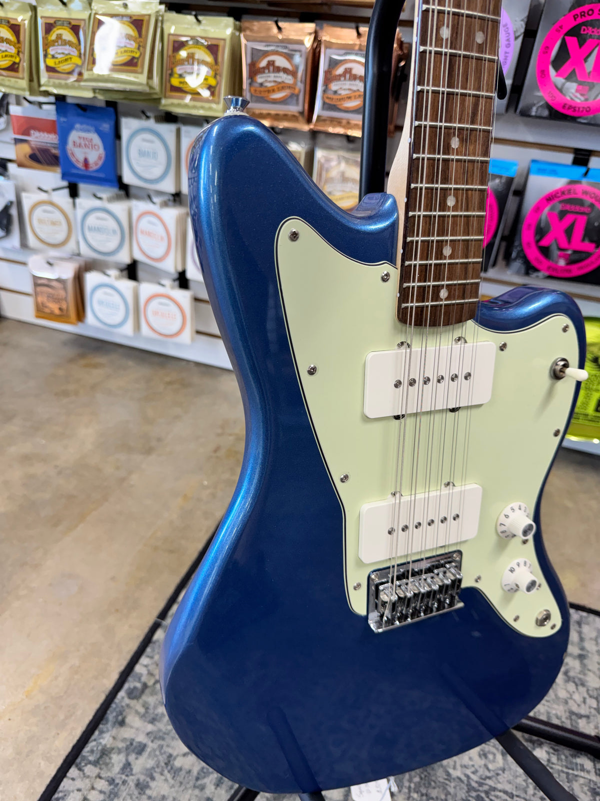 Used Squier Paranormal Jazzmaster XII 12-string, Lake Placid Blue - angled body view