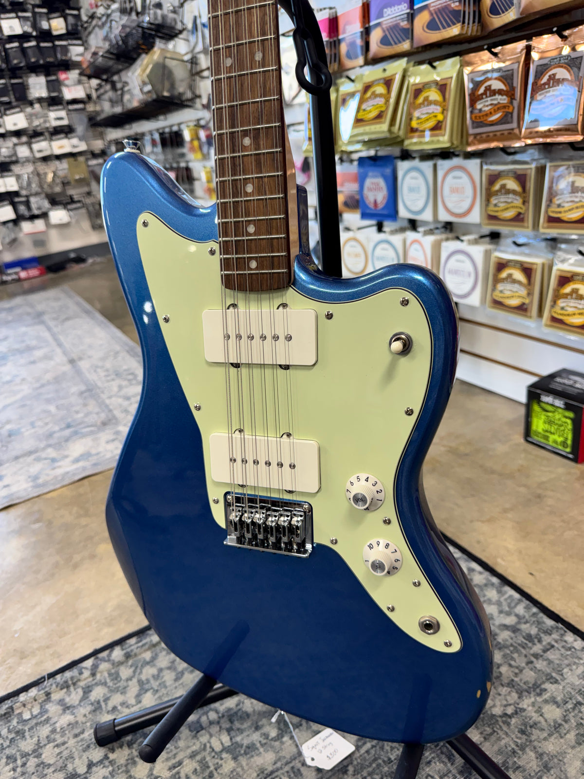 Used Squier Paranormal Jazzmaster XII 12-string, Lake Placid Blue - angled body view, other side